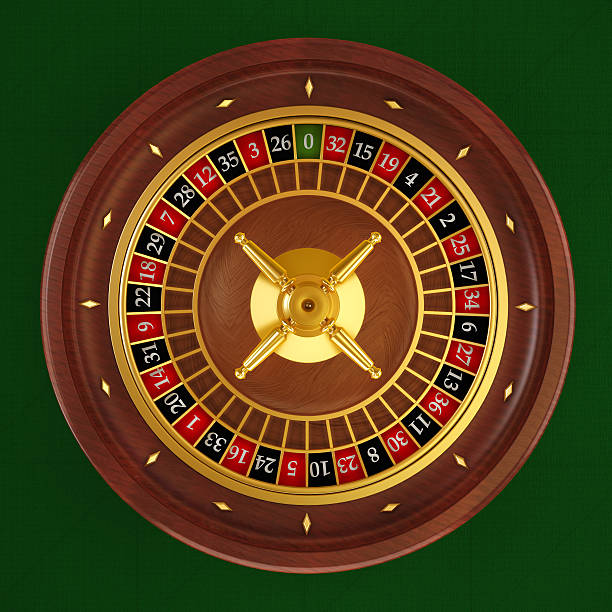 Close-up of SA Gaming baccarat table layout with cards and betting positions